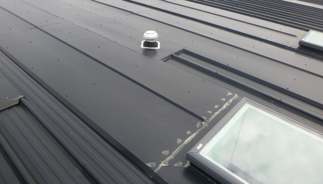 Roofing Design and Quality Control Photograph showing roofing design and quality control in action